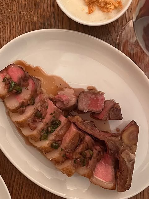 Sliced Mangalitsa pork and lardo on the plate